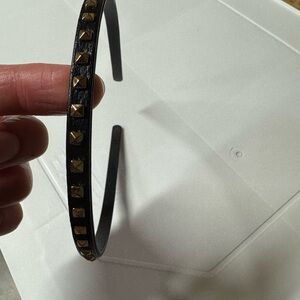 Black Hair Accessories with Textured Design and Circular Shape